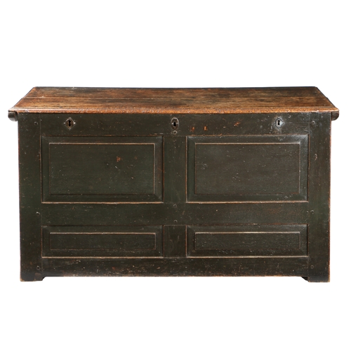 169 - AN 18TH CENTURY OAK CHEST. the rectangular top above three locks and four panels to the front, 136cm... 