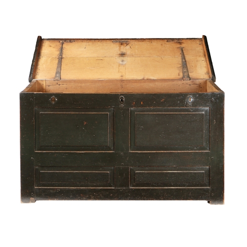 169 - AN 18TH CENTURY OAK CHEST. the rectangular top above three locks and four panels to the front, 136cm... 