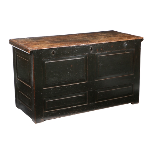 169 - AN 18TH CENTURY OAK CHEST. the rectangular top above three locks and four panels to the front, 136cm... 