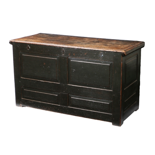 169 - AN 18TH CENTURY OAK CHEST. the rectangular top above three locks and four panels to the front, 136cm... 