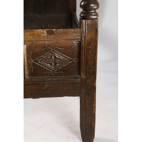 170 - CHARLES II OAK TESTER BED, LANCASHIRE, CIRCA 1670 AND LATER. Having a nine carved-panelled canopy, t... 