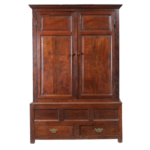 171 - AN OAK LIVERY CUPBOARD, ENGLISH, CIRCA 1700-30. Having a cyma-recta cornice, and a pair of doors wit... 