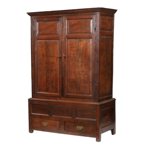 171 - AN OAK LIVERY CUPBOARD, ENGLISH, CIRCA 1700-30. Having a cyma-recta cornice, and a pair of doors wit... 