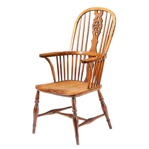 18 - A GEORGE III WINDSOR CHAIR, STAMPED PARMAN. with a arched back with a wheel and spindle back raised ... 