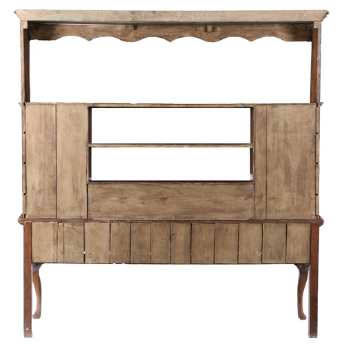 181 - A GEORGE III YEW WOOD DRESSER AND RACK, CIRCA 1790. The ogee cornice above an undulating apron and t... 