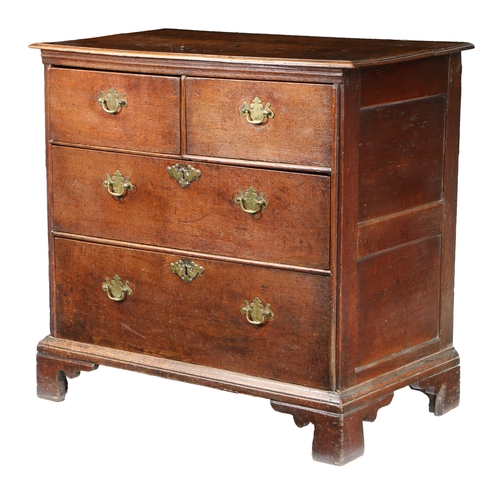 188 - A GEORGE II OAK CHEST OF DRAWERS, CIRCA 1740. The rectangular top above two short and two long drawe... 