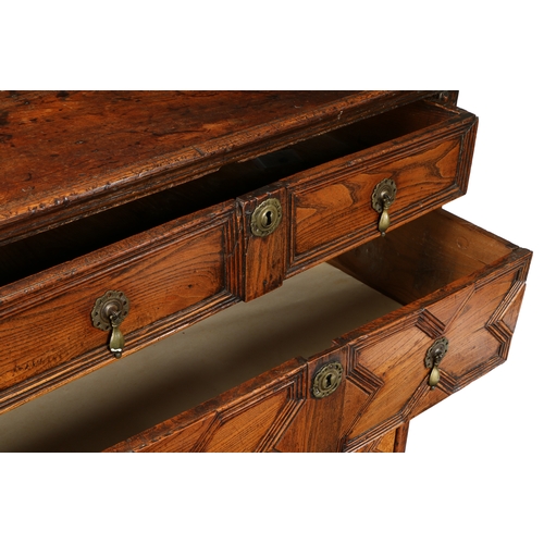 189 - A CHARLES II ELM GEOMETRIC CHEST OF DRAWERS, CIRCA 1660. The rectangular top above four long moulded... 