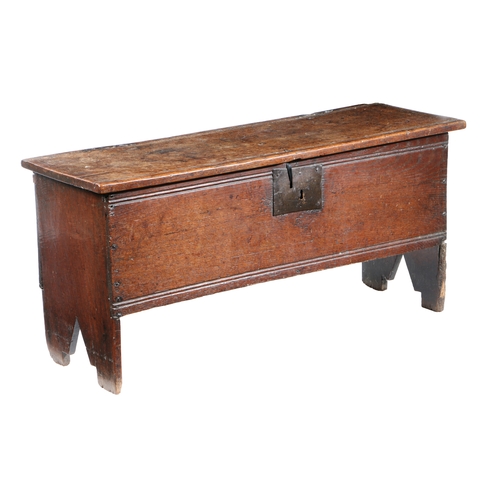 198 - A MID-17TH CENTURY OAK BOARDED CHEST, CIRCA 1630-60. Constructed from single-piece boards, the lid a... 