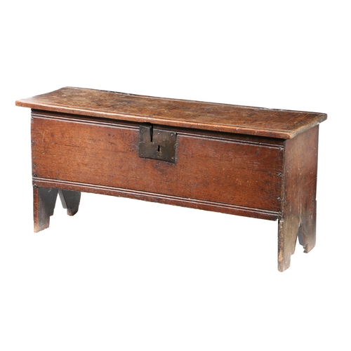 198 - A MID-17TH CENTURY OAK BOARDED CHEST, CIRCA 1630-60. Constructed from single-piece boards, the lid a... 