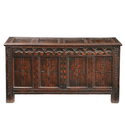 199 - AN ELIZABETH I/JAMES I OAK AND INLAID COFFER, CIRCA 1600-20. Having a quadruple-panelled hinged lid,... 