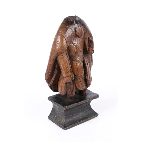 207 - A 15TH/16TH CENTURY CARVED FIGURE, POSSIBLY LIME WOOD. Lacking head and limbs, the body with open ca... 