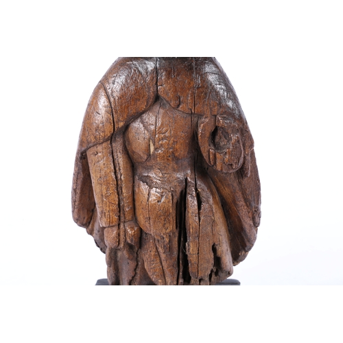 207 - A 15TH/16TH CENTURY CARVED FIGURE, POSSIBLY LIME WOOD. Lacking head and limbs, the body with open ca... 