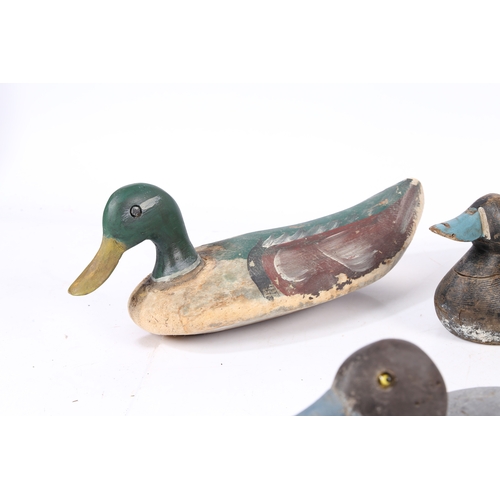 212 - FIVE POLYCHROME-DECORATED DECOY DUCKS. Each of typical naturalistic form, with coloured bill, two wi... 