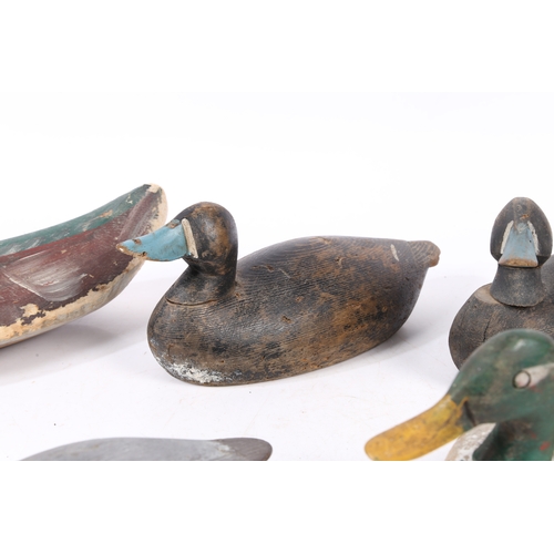 212 - FIVE POLYCHROME-DECORATED DECOY DUCKS. Each of typical naturalistic form, with coloured bill, two wi... 