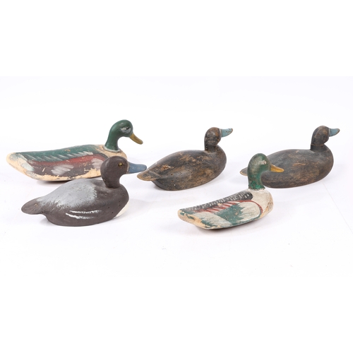 212 - FIVE POLYCHROME-DECORATED DECOY DUCKS. Each of typical naturalistic form, with coloured bill, two wi... 