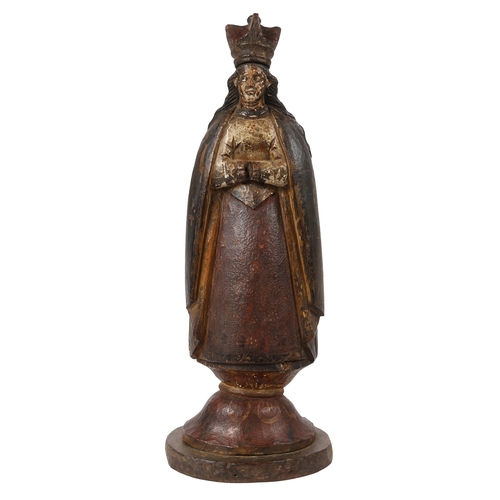 215 - A LATE 18TH CENTURY SPANISH COLONIAL POLYCHROME CARVED WOODEN FIGURE. crowned figure with a cape and... 