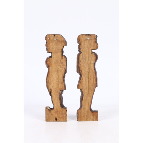 216 - A SMALL PAIR OF 17TH CENTURY OAK FIGURAL TERMS, FLEMISH. Each designed as a standing male, with long... 