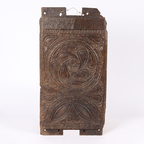 221 - A MID-15TH CENTURY CARVED OAK PANEL, CIRCA 1450. Principally carved with a large mouchette-filled oc... 