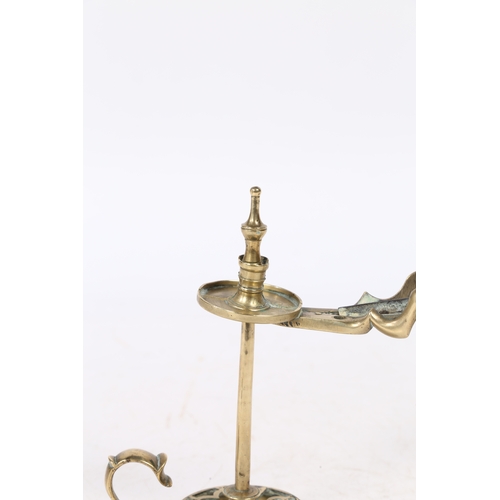 235 - A GEORGE III BRASS WAX JACK. with scissor handles to the sprung wax holder above a stem and a heart ... 