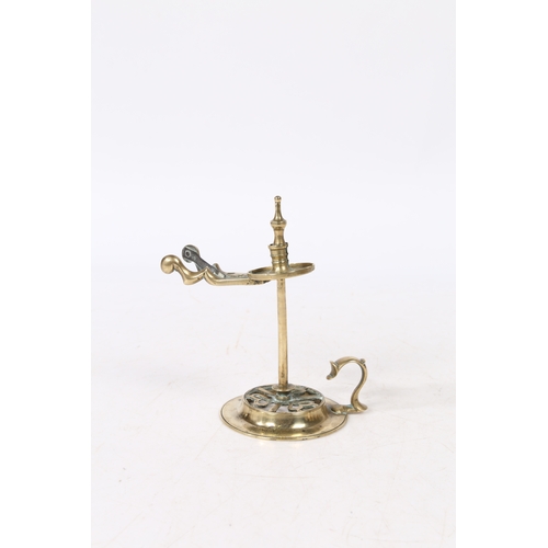 235 - A GEORGE III BRASS WAX JACK. with scissor handles to the sprung wax holder above a stem and a heart ... 