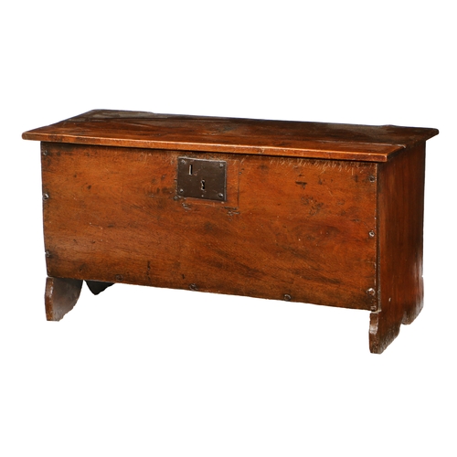 29 - A MID-17TH CENTURY SMALL OAK COFFER, ENGLISH. The hinged lid with square-edge, iron lock plate, the ... 