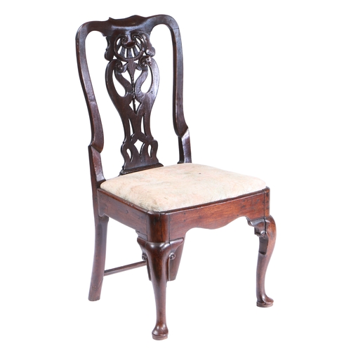 454 - A GEORGE II OAK SIDE CHAIR, CIRCA 1740. Having a vaseoid pierced splat, serpentine cresting and shap... 