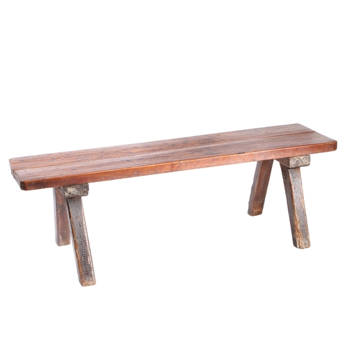 51 - A 19TH CENTURY ELM PIG BENCH. the rectangular two plank top above four angled chamfered legs, 141cm ... 
