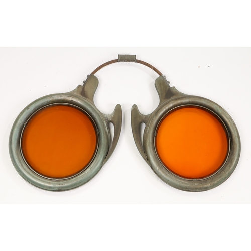 53 - AN UNUSUAL EARLY 20TH CENTURY OPTICIANS TRADE SIGN. in the form of a pair of metal spectacles with o... 