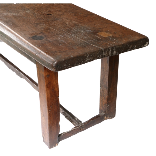 581 - A 16TH/17TH CENTURY OAK AND WALNUT REFECTORY TABLE. Having an impressive single-piece and deep recta... 