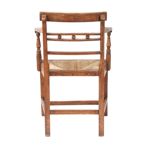 584 - A GEORGE III ELM AND FRUITWOOD OPEN MENDLESHAM ARMCHAIR, SUFFOLK. With bar top rail and sphere embel... 