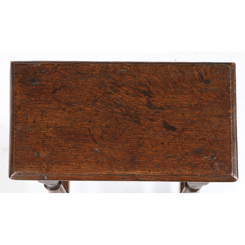 588 - A CHARLES II OAK JOINT STOOL, CIRCA 1660. Having an ovolo-moulded top, the rails with lower run-moul... 