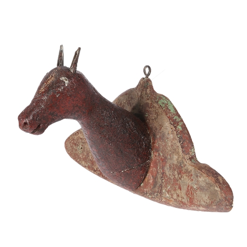 59 - AN EARLY 20TH CENTURY AMERICAN FOLK ART HORSE TROPHY HEAD. The red crackled painted head and neck mo... 