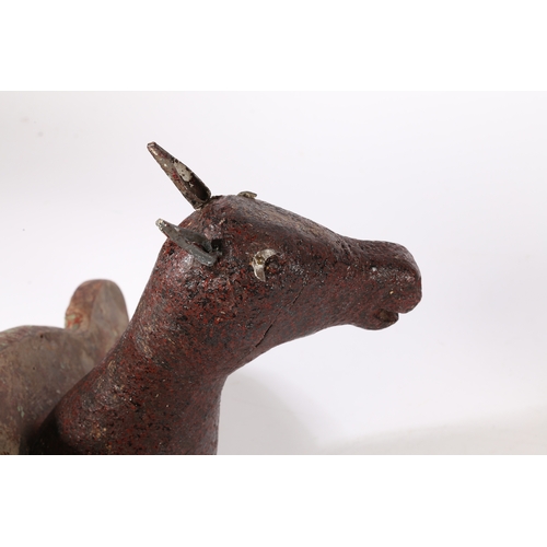 59 - AN EARLY 20TH CENTURY AMERICAN FOLK ART HORSE TROPHY HEAD. The red crackled painted head and neck mo... 