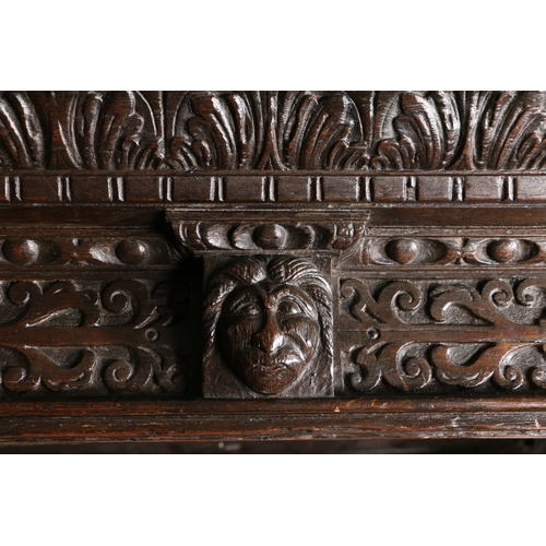 590 - AN IMPRESSIVE ELIZABETH I OAK AND INLAID TESTER BED, CIRCA 1580 AND LATER. The panelled tester centr... 