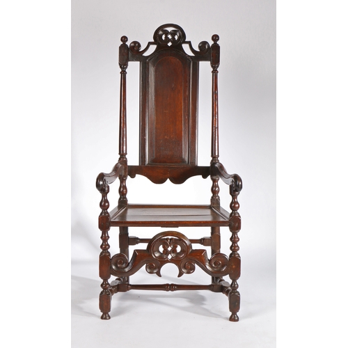 6 - A GOOD WILLIAM & MARY JOINED OAK OPEN ARMCHAIR, CIRCA 1690. The part open back with arched-fielded p... 