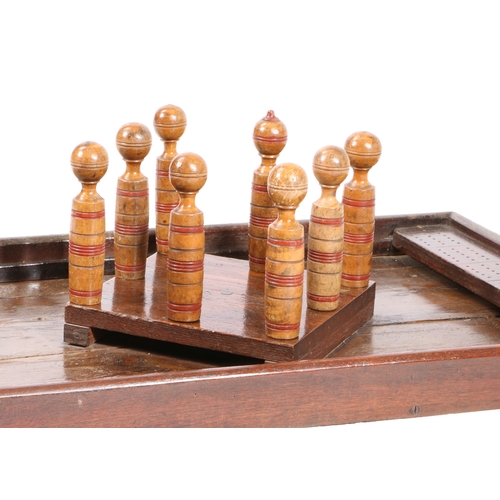 67 - A 19TH CENTURY FOLK ART OAK SKITTLES GAME. having a long pole with a ball connected by a chain toget... 