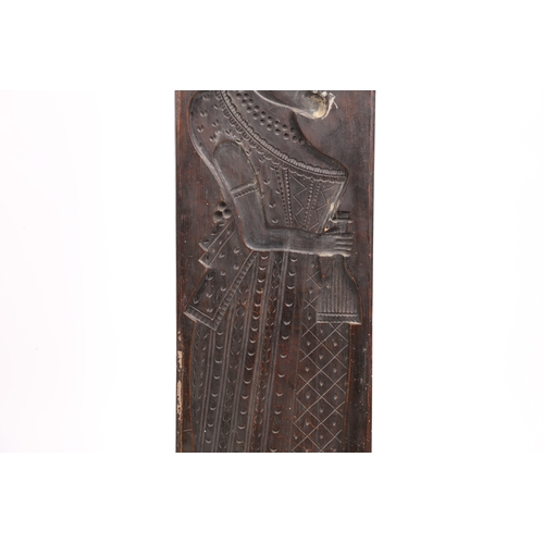 71 - A LARGE GERMAN CARVED FRUITWOOD GINGERBREAD MOULD 19TH CENTURY. Carved in low relief depicting a man... 