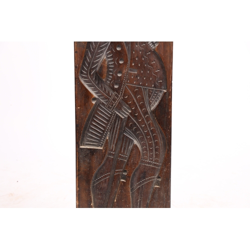 71 - A LARGE GERMAN CARVED FRUITWOOD GINGERBREAD MOULD 19TH CENTURY. Carved in low relief depicting a man... 