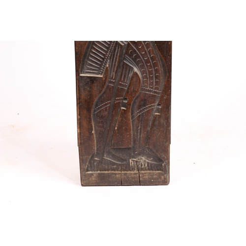 71 - A LARGE GERMAN CARVED FRUITWOOD GINGERBREAD MOULD 19TH CENTURY. Carved in low relief depicting a man... 