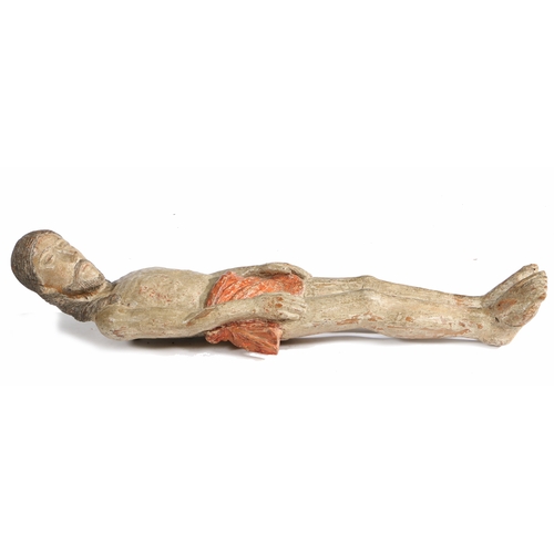 83 - A 17TH CENTURY CARVED AND POLYCHROME-DECORATED CORPUS CHRISTI. With typical long limbs, eyes closed ... 