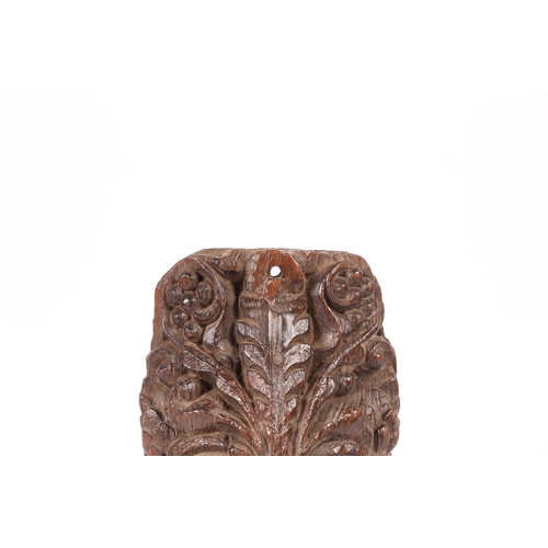 84 - A 17TH CENTURY TEAK CORBEL. Designed as a large scrolling leaf, with hops and fruiting vine, height ... 