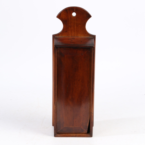 86 - A GEORGE III YEW WOOD CANDLE BOX, CIRCA 1800. The backplate with extended curved top for hanging, th... 