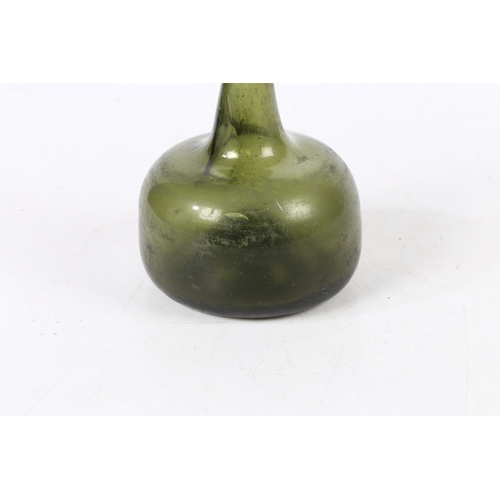 93 - A 18TH CENTURY ENGLISH ONION WINE BOTTLE. having a dumpy stem and a bulbous body, 17cm high.