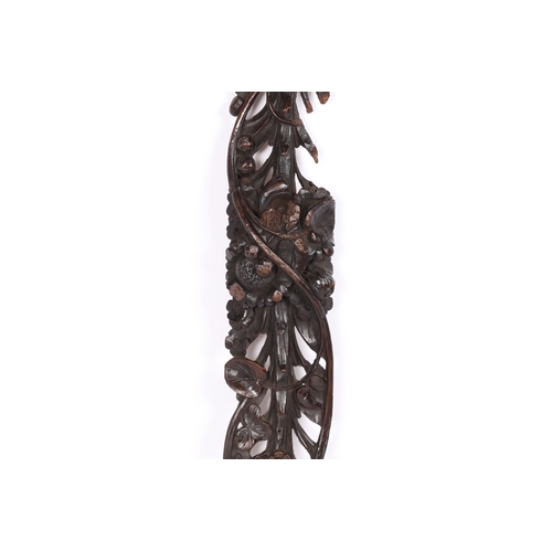 97 - A CARVED WALNUT APPLIQUÉ, ENGLISH, CIRCA 1700-30. In the manner of Grinling Gibbons, carved and pier... 