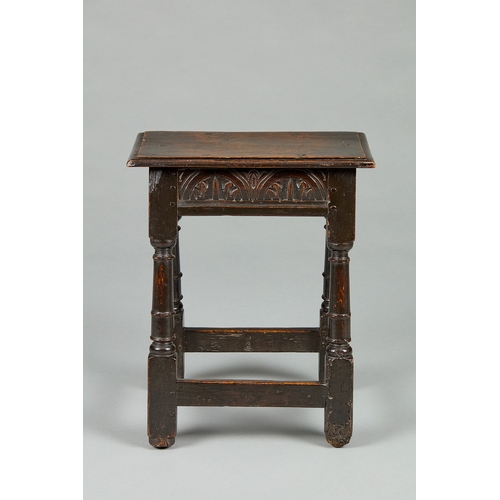 10 - A BOLD CHARLES I OAK JOINED STOOL, GLOUCESTERSHIRE, CIRCA 1630-1640. The rectangular six peg top wit... 