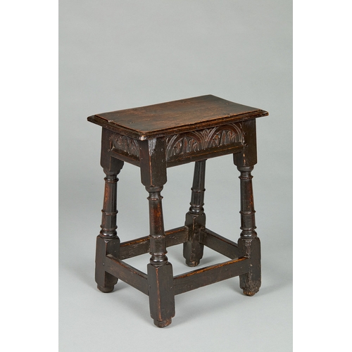 10 - A BOLD CHARLES I OAK JOINED STOOL, GLOUCESTERSHIRE, CIRCA 1630-1640. The rectangular six peg top wit... 