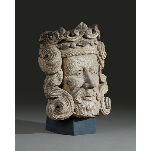 104 - A 15TH CENTURY LIMESTONE HEAD OF EDWARD III, ENGLISH, CIRCA 1400-1450. The high relief Limestone car... 