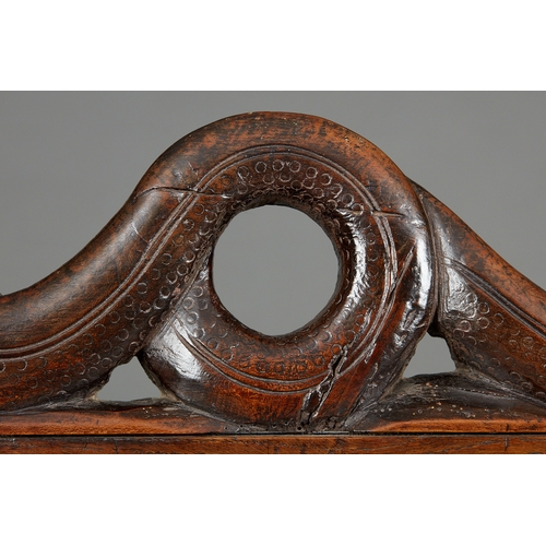 105 - AN EXCEPTIONAL LARGE ELIZABETHAN OAK SETTLE, WITH REMARAKBLE DOUBLE SERPENT CRESTING IN WALNUT, ENGL... 