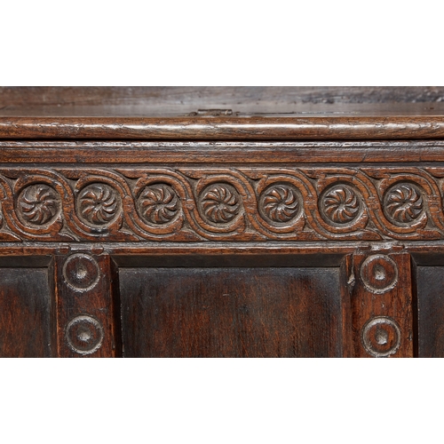 105 - AN EXCEPTIONAL LARGE ELIZABETHAN OAK SETTLE, WITH REMARAKBLE DOUBLE SERPENT CRESTING IN WALNUT, ENGL... 