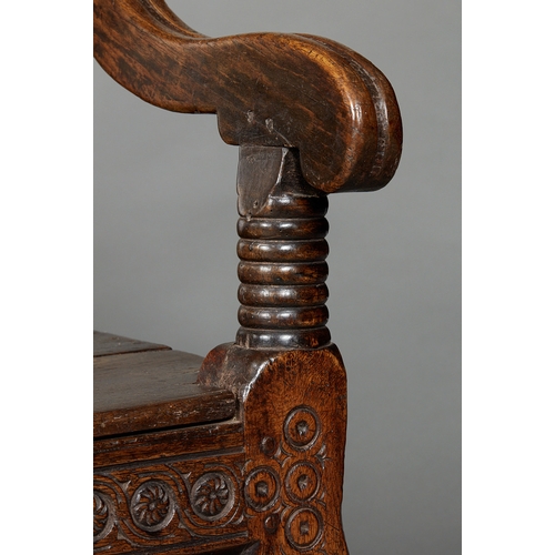 105 - AN EXCEPTIONAL LARGE ELIZABETHAN OAK SETTLE, WITH REMARAKBLE DOUBLE SERPENT CRESTING IN WALNUT, ENGL... 